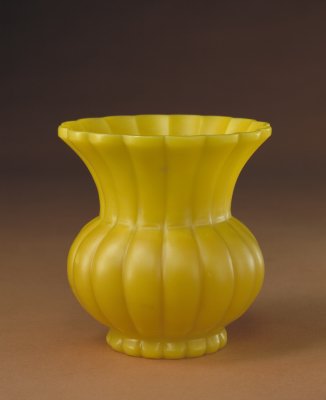 Yellow glass orange petal type slag bucket